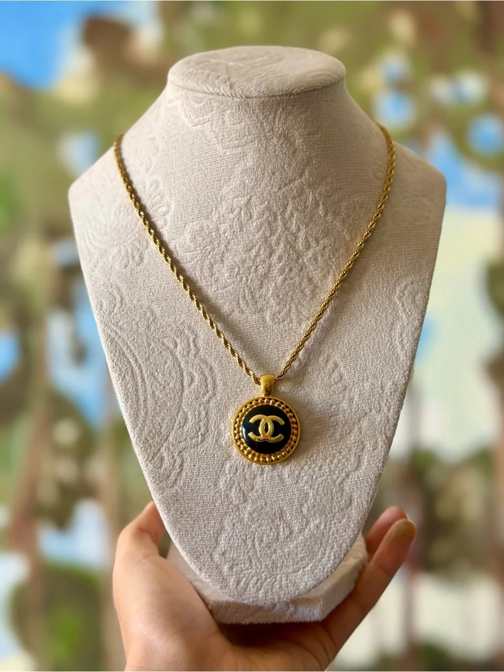 CHANEL Gold and Black Round CC Medallion Necklace